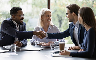 Photo of wealth advisor helping client.